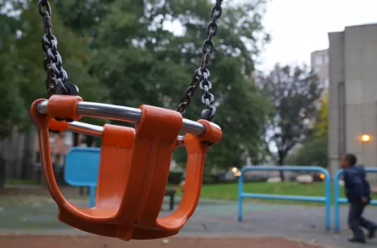 Empty child's swing at a playground