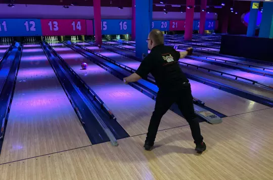 Picture of someone playing tenpin bowling